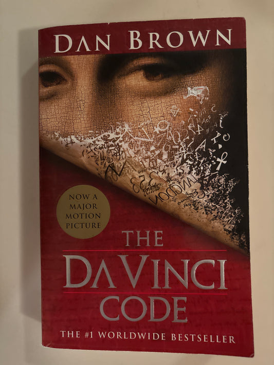 The Da Vinci Code (Robert Langdon) by Dan Brown (Author)  Format: Paperback