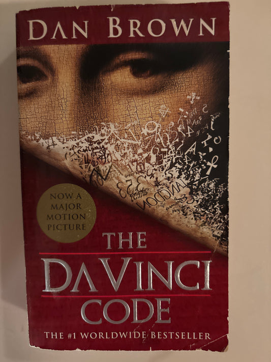 The Da Vinci Code (Robert Langdon) by Dan Brown (Author)  Format: Paperback