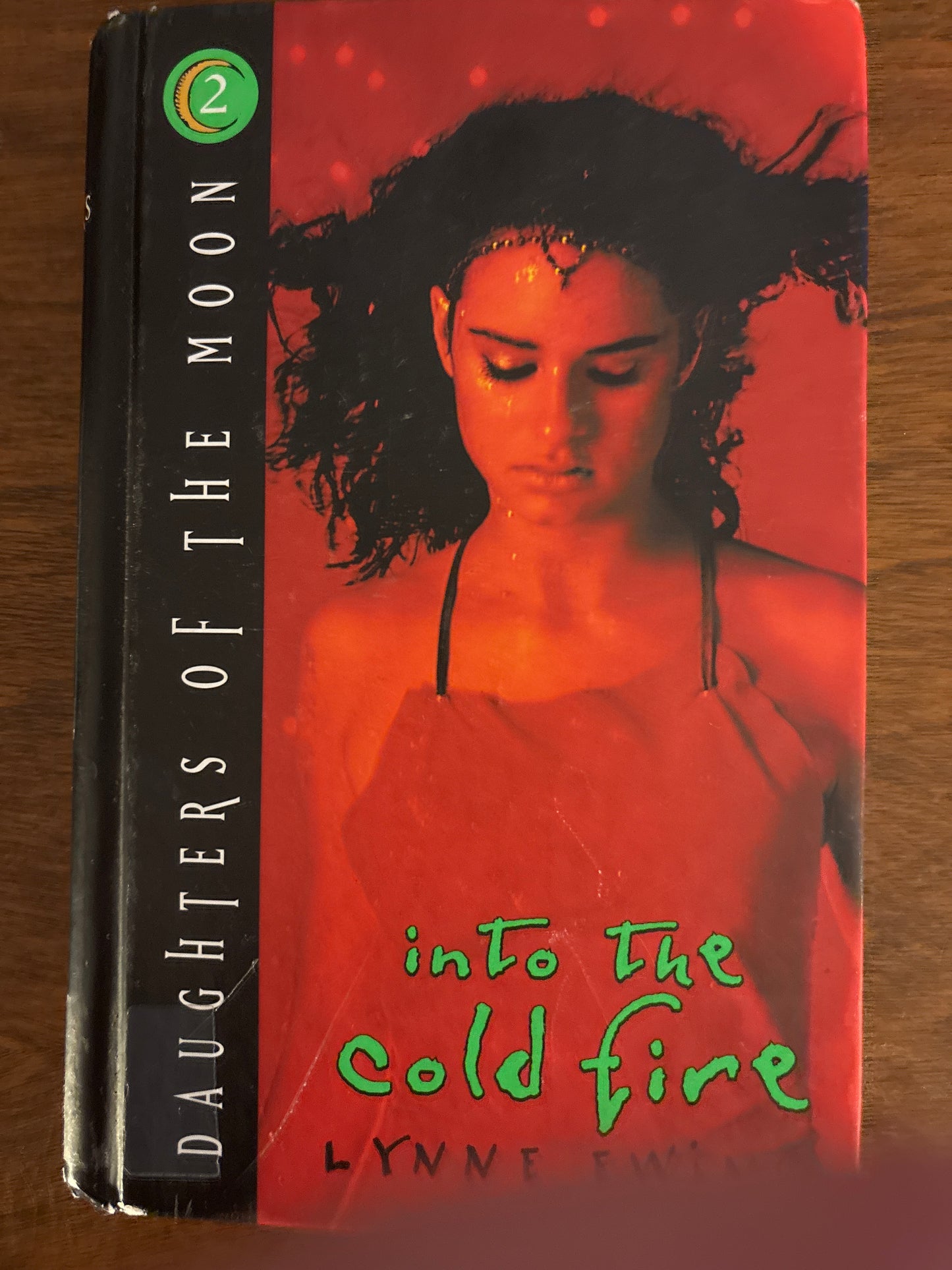 Into the Cold Fire (Daughters of the Moon #2) by Lynne Ewing (Author)